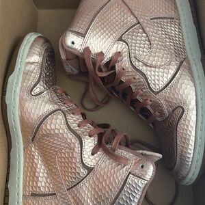 Nike Women’s High-Top Sneakers in Metallic Rose